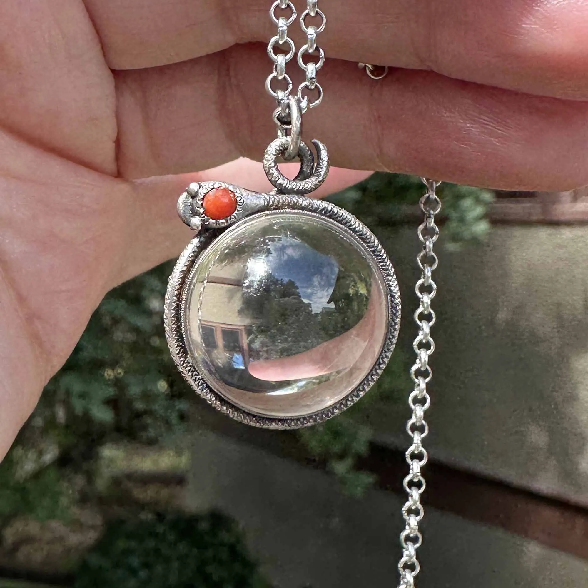 Art Deco Pools of Light Rock Crystal Coral Snake Pendant