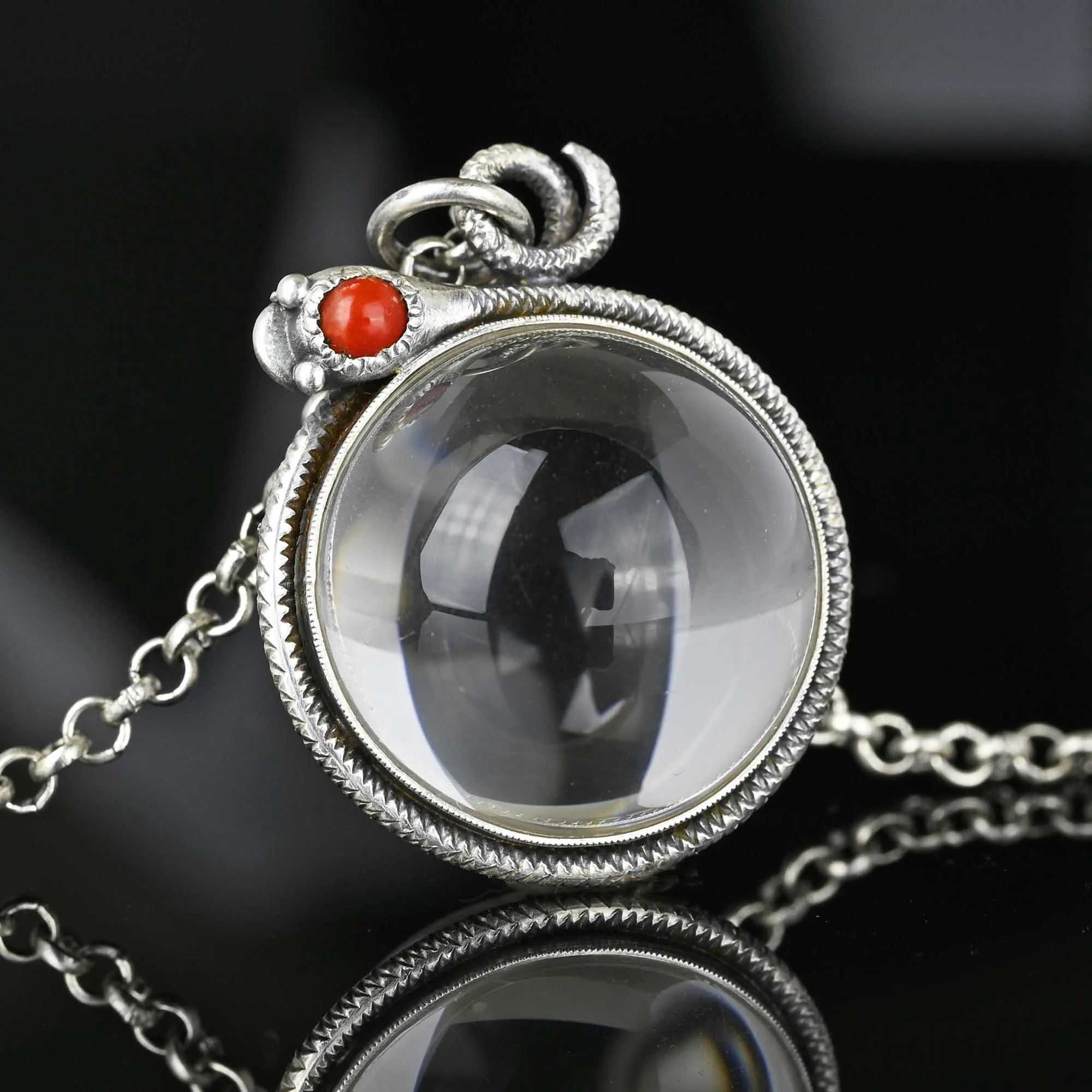 Art Deco Pools of Light Rock Crystal Coral Snake Pendant