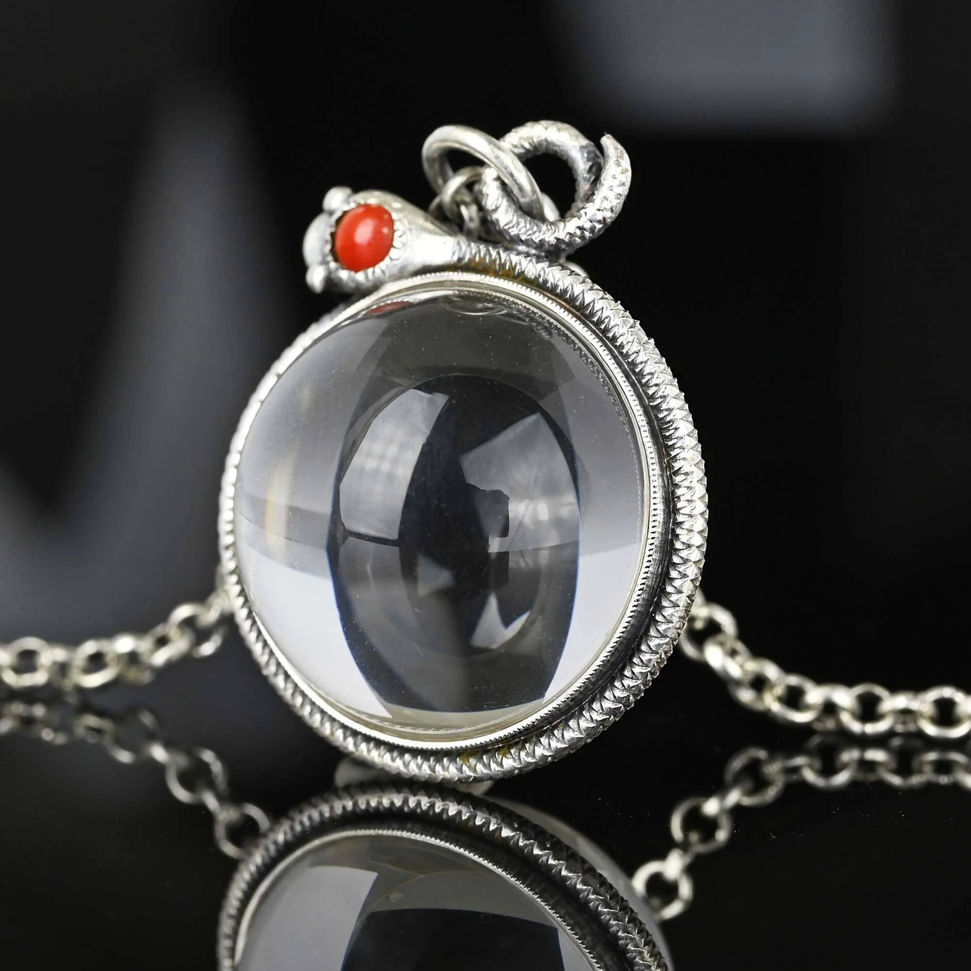 Art Deco Pools of Light Rock Crystal Coral Snake Pendant
